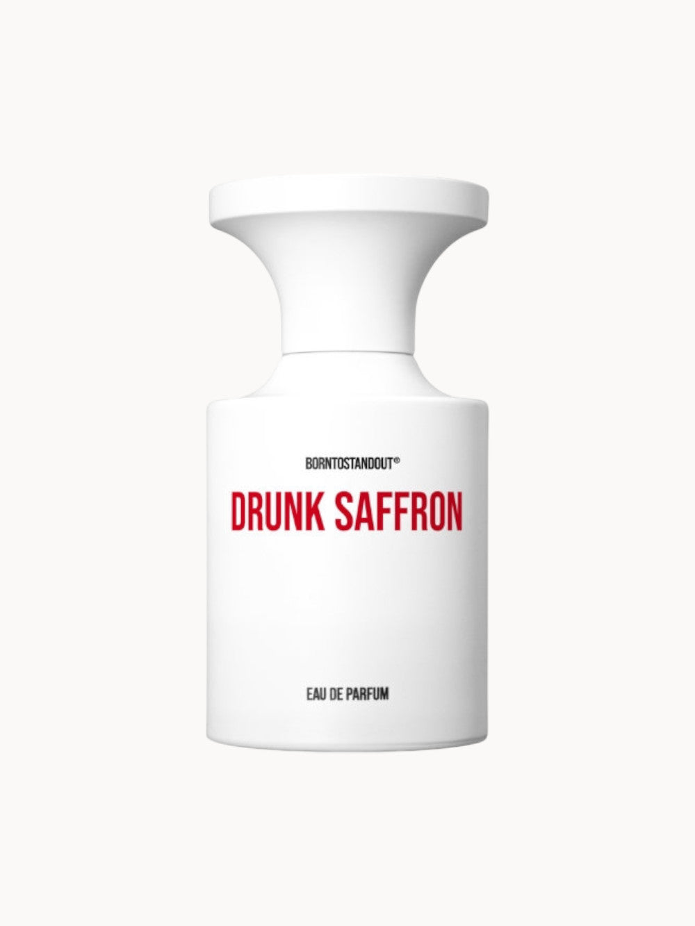 Flakon des Drunk Saffron Eau de Parfum von BORNTOSTANDOUT, weißer zylindrischer Flakon mit rotem Schriftzug.