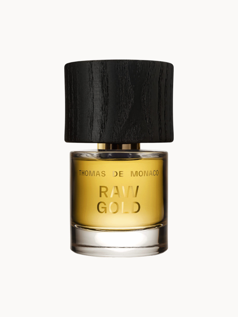 Flakon des Parfums Raw Gold Extrait de Parfum von Thomas de Monaco mit goldenem Duftinhalt und edlem, schwarzem Holzverschluss.