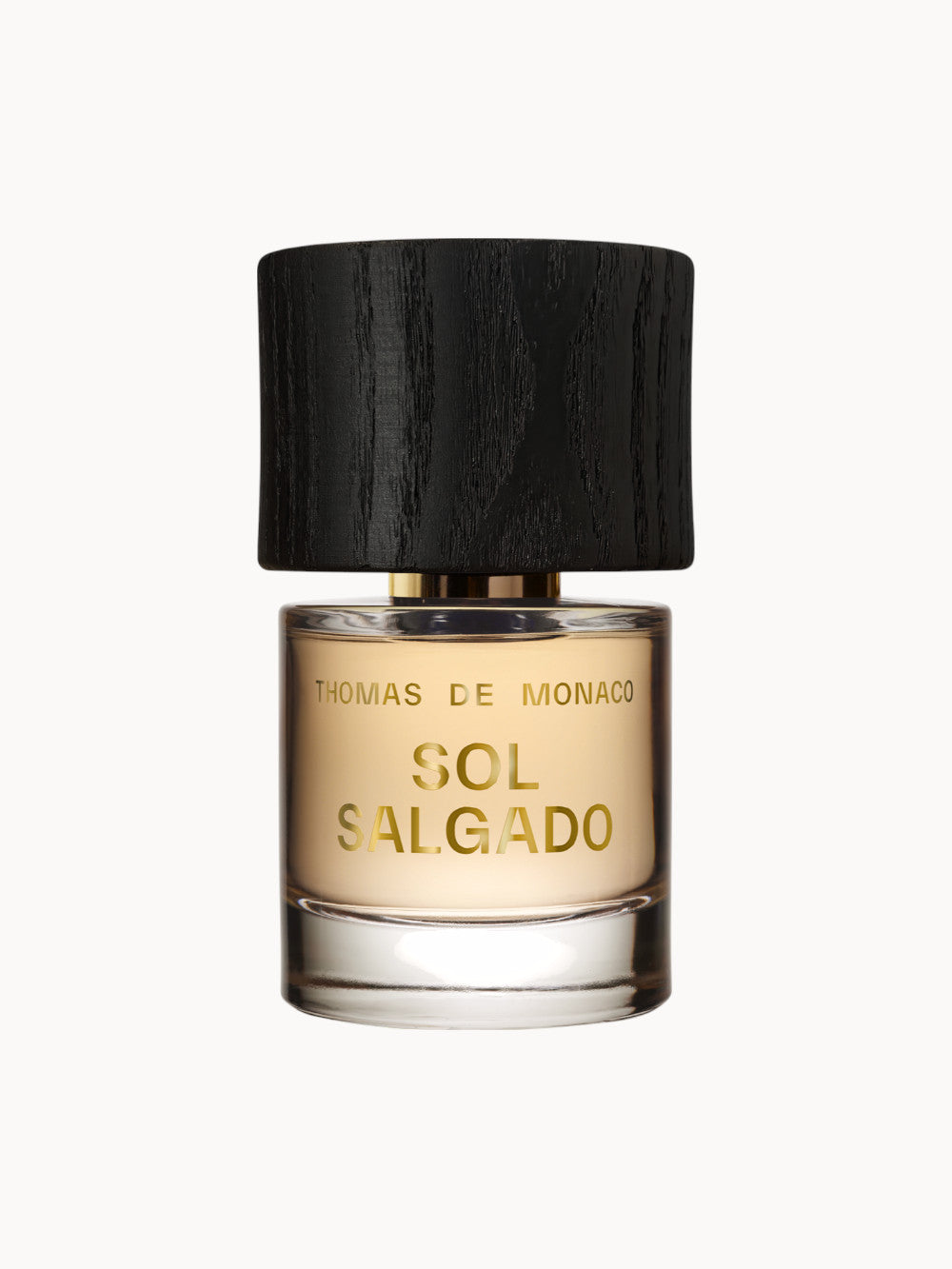 Flakon des Parfums Sol Salgado Extrait de Parfum von Thomas de Monaco mit hellem Duftinhalt und elegantem, schwarzem Holzverschluss.